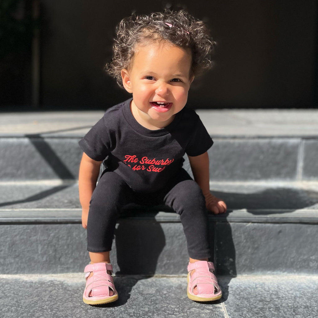 The Suburbs are for Suckers Baby Tee, black | themomemans.com by Monica Escobar Allen