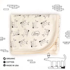 Sherman Organic Cotton Gender-Neutral Baby Blankets. Eco-friendly Unisex Styles for Hipster Babies. The MoMeMans by Monica Escobar Allen. Brooklyn, NY