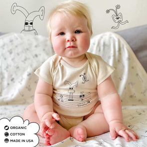 Organic Cotton Onesies. Unisex Styles for for the eco-conscious baby registries. The MoMeMans® by Monica Escobar Allen. Small batches made in Brooklyn, NY. Style: Bots Family