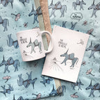 The Struggle is Real Mug and Journal. The MoMeMans® by Monica Escobar Allen.