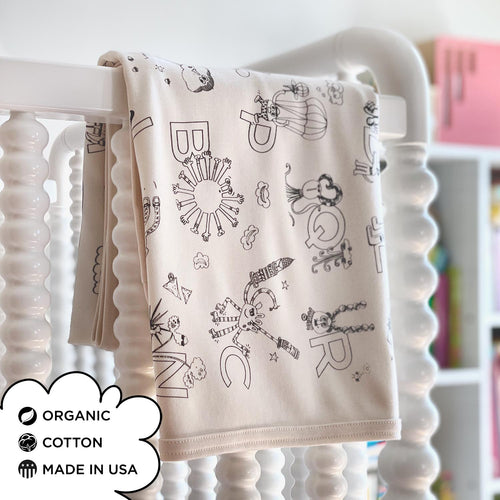 ZYX Project Organic Cotton Gender-Neutral Baby Blankets. Eco-friendly Unisex Styles for Hipster Babies. The MoMeMans by Monica Escobar Allen. Brooklyn, NY