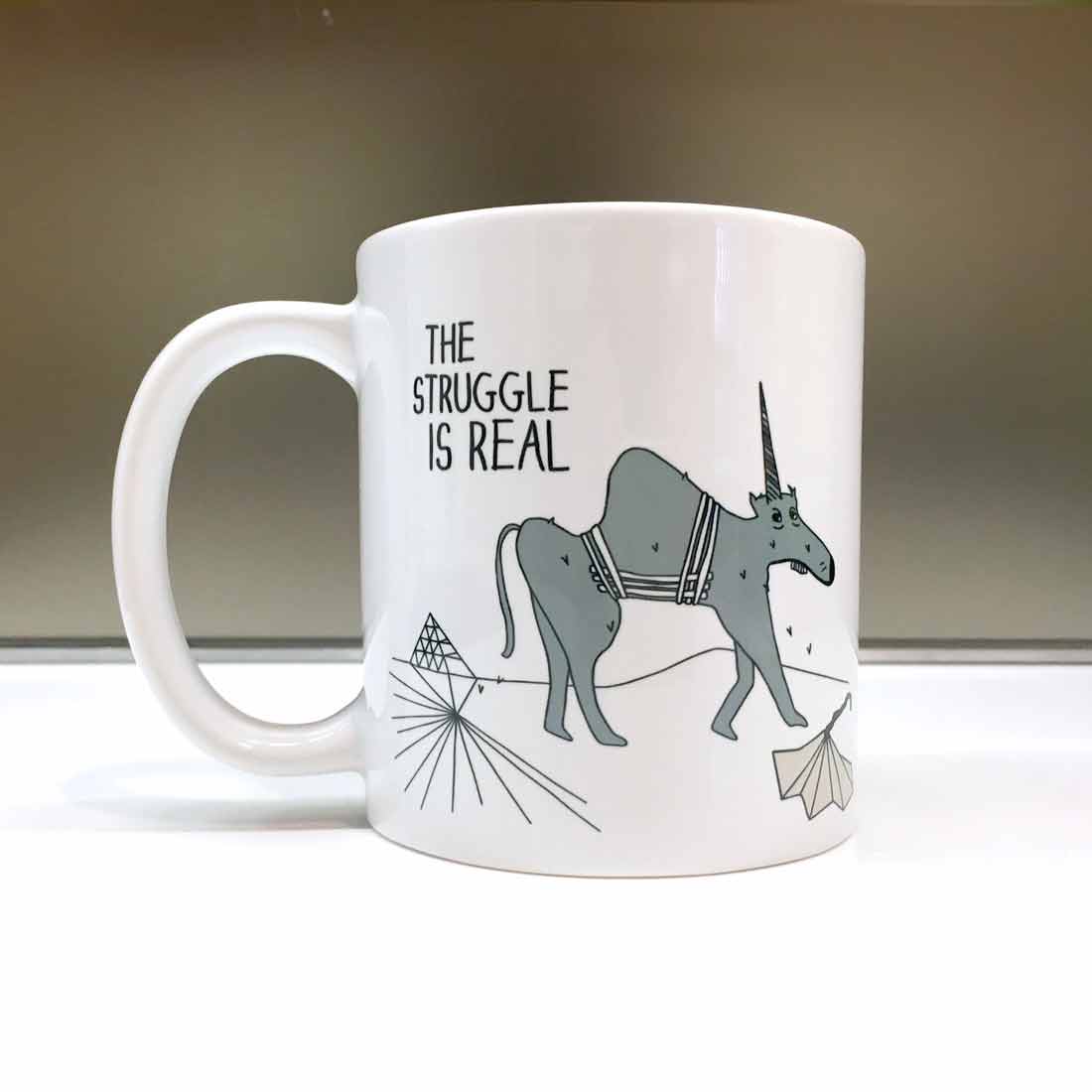 The Struggle is Real Mug. The MoMeMans® by Monica Escobar Allen. themomemans.com